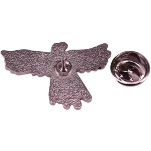 Bird-shaped metal enamel brooch back view with butterfly clutch and matte finish