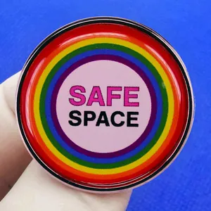 Rainbow Safe Space enamel pin badge featuring round concentric circles and polished finish