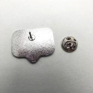 Silver metal badge back view featuring butterfly clasp and sandblasted matte finish