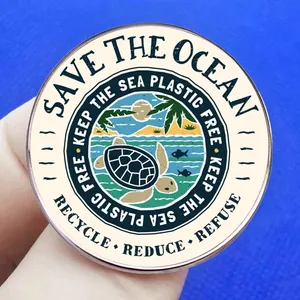 Save the Ocean enamel pin featuring sea turtle and ocean nature elements on blue background