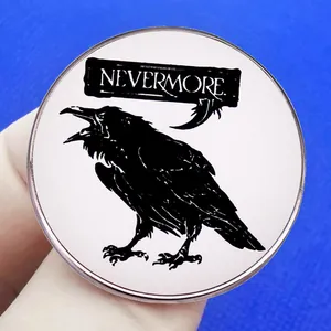 Vintage Nevermore Raven lapel pin badge in minimalist black and white alloy design