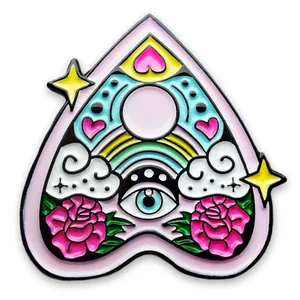Colorful planchette enamel pin with rainbow and mystic eye on a clean white background