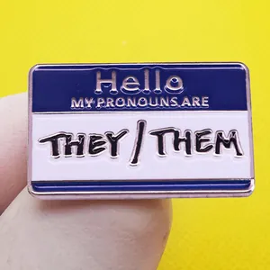 Hello My Pronouns Are They Them enamel pin badge in blue and white metal design