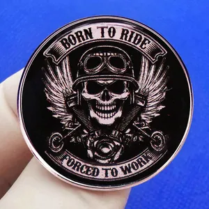 Born To Ride motorcycle skull metal badge with wings and crossed wrenches design