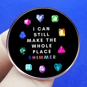 Taylor Swift inspired enamel pin with Bejeweled lyrics on a black background