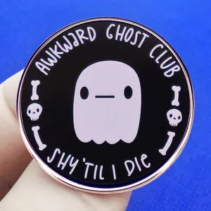 Awkward Ghost Club enamel pin with Shy Til I Die text and skeleton motifs in metal finish
