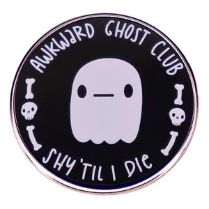 Awkward Ghost Club enamel pin with Shy Til I Die text and skeleton bone design