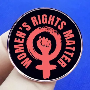 Women's Rights Matter enamel pin badge featuring a pink feminist fist and Venus symbol