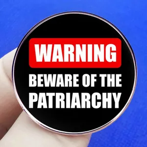 Beware of the Patriarchy feminist enamel pin badge with warning sign design on blue background