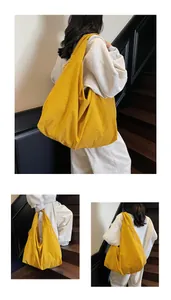 Detailed views of a large yellow nylon tote bag featuring natural texture and broad straps