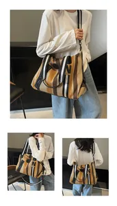 Detail of multi-color striped tote bag with large capacity and woven canvas texture