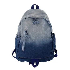 Sac à dos en toile denim délavée dégradé bleu pour étudiants avec détails de pompons