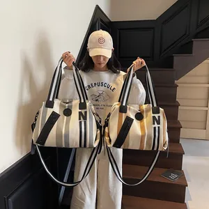 Striped woven large capacity tote bag with shoulder strap and stylish letter logo