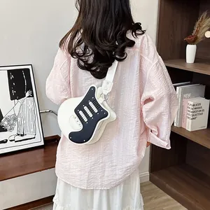 Detailed back view of a guitar-shaped crossbody bag with black and white PU design