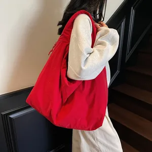 Large red hobo tote bag made of lightweight wrinkled nylon for women's daily commute