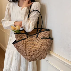 Large capacity straw woven tote bag with black leather straps for summer beach vacation