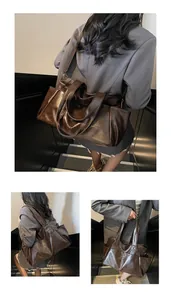 Detail view of large brown tote bag with side pockets and sturdy top handles for daily use
