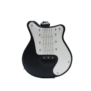 Unique black and white guitar-shaped crossbody bag with silver rivet details on white background