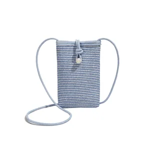 Mini light blue woven crossbody phone bag with striped pattern and drawstring closure