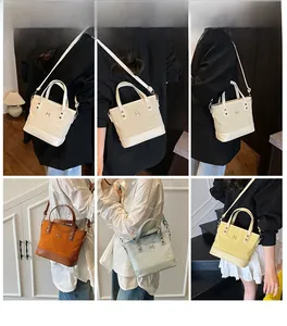 Collage of four colors of minimalist leather and canvas tote bags with adjustable straps