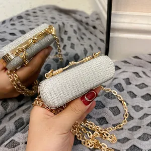 Luxury silver rhinestone cylinder evening clutch bag with gold chain and metal clasp