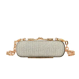 Elegant champagne sequin capsule evening clutch bag with gold chain and metal kiss-lock