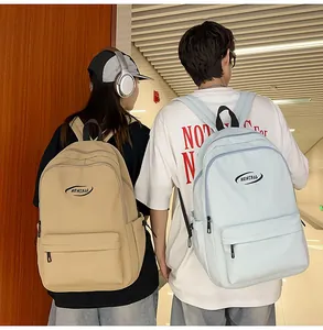 Detail of durable nylon backpack showing side pocket and adjustable shoulder straps