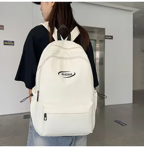 Side view of cream high-capacity backpack with drawstring side pockets and dual zippers
