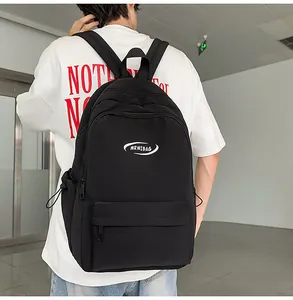 Detail of black large-capacity school backpack with MRMIBAG logo and multi-pocket design