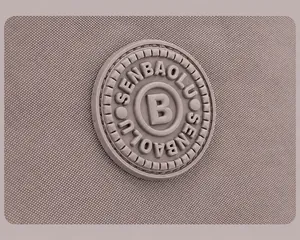 Macro detail of the round rubber logo and high-density nylon fabric on this casual tote