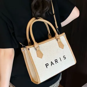 Chic beige canvas and brown leather tote bag with Paris embroidery and shoulder strap