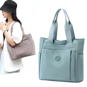 Large capacity nylon tote bags in blue and purple with multi-pocket design for women