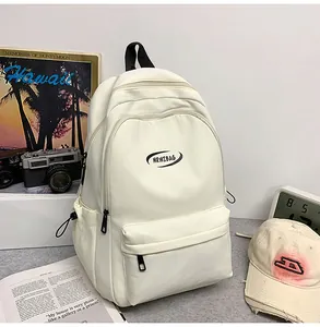 Detailed view of off-white minimalist backpack featuring large capacity and brand logo print