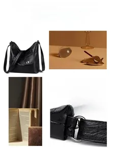 Close-up of black retro shoulder bag showing lychee grain texture and metal buckle detail