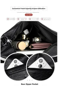 Macro view of multi-compartment interior and back zipper pocket of retro black leather bag