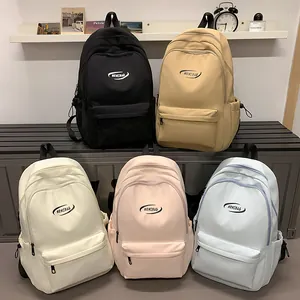 Minimalist waterproof school backpacks in multiple colors with large capacity and logo