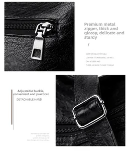 Detailed close-up of premium metal zippers and adjustable buckles on a black vintage leather bag
