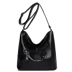 Retro black leather shoulder bag with multiple pockets and adjustable strap for women