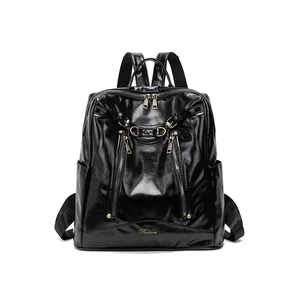 Sac à dos rétro en cuir PU noir pour femme avec zips argentés et détails de chaîne