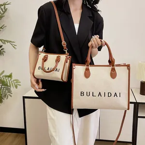 Vintage-Set aus Canvas-Einkaufstasche und Umhängetasche in Beige mit braunem Lederbesatz