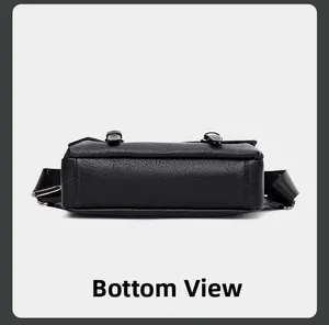 Detailed bottom view of black PU leather messenger bag showing stitching and texture