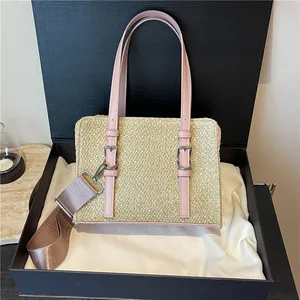 Straw woven handbag with pink leather trim and detachable shoulder strap for summer beach