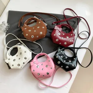 Chic rivet underarm bags for women in five colors with bow detail and shoulder strap