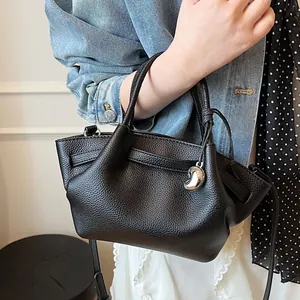 Retro black lychee grain leather wing tote bag with heart charm for women