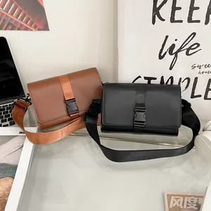 Minimalist square messenger bags in black and brown faux leather with buckle and wide strap