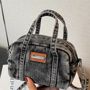Retro washed grey denim boston handbag with top handles and adjustable strap