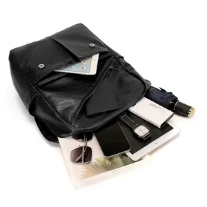 Large black textured leather backpack with high storage capacity for travel and commute