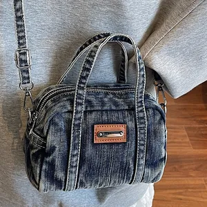 Retro washed denim handbag with dual top handles and adjustable strap for women
