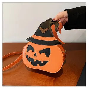 Detailed view of pumpkin-shaped crossbody bag with a wizard hat for Halloween costume