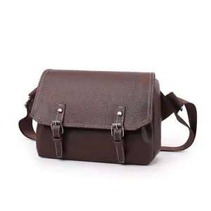 Waterproof brown PU leather crossbody messenger bag with buckle straps and contrast stitching